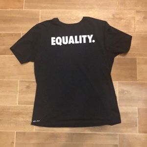 Black equality shirt made by Nike